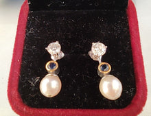 Laden Sie das Bild in den Galerie-Viewer, Brillantohrstecker mit Saphiren und Perlen in 14 Karat Weißgold