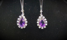 Laden Sie das Bild in den Galerie-Viewer, Ohrstecker mit Amethysttropfen  (ca. 4, 0 ct) und Brillanten in 18 Karat Weißgold